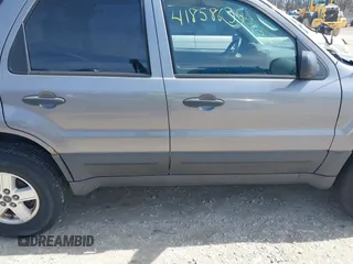 2007 Ford Escape XLS с VIN 1FMYU02Z77KA62394, выставлен на аукционе IAAI как лот 41858635 с пробегом 165 948 миль миль и . История ставок и продаж доступна на DreamBid. Изображение 13.