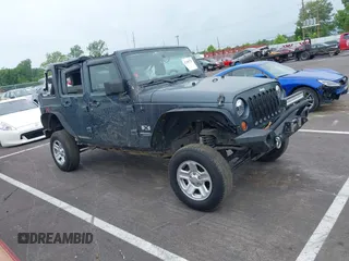 2008 Jeep Wrangler Unlimited X with VIN 1J4GA39178L570624, listed as a IAAI auction lot 42285778 with 189,238 mi miles and . Bid and sale history available at DreamBid. Image 13.