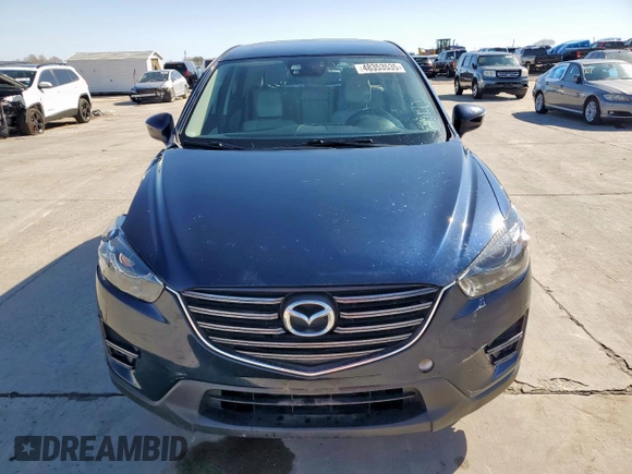 2016 Mazda CX-5 Grand Touring with VIN JM3KE2DY6G0668313, listed as a Copart auction lot 48353535 with 70,085 mi miles and Salvage Title. Bid and sale history available at carsss.com. Image 5.