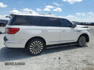 2019 Lincoln Navigator Reserve z VIN 5LMJJ2LT9KEL19544, wystawiony jako Copart lot #52240315 z przebiegiem 74 144 mil mil oraz Szkody całkowita. Historia ofert i sprzedaży dostępna na DreamBid. Obrazek 3.