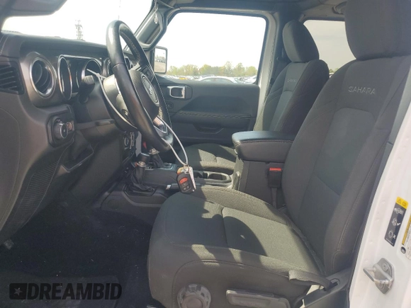 2021 Jeep Wrangler Unlimited Sahara с VIN 1C4HJXEN7MW823881, выставлен на аукционе Copart как лот 53062425 с пробегом 28 597 миль миль и Списание • Salvage title. История ставок и продаж доступна на DreamBid. Изображение 7.