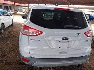 2013 Ford Escape SE with VIN 1FMCU0G95DUD02318, listed as a IAAI auction lot 42195213 with 202,434 mi miles and . Bid and sale history available at DreamBid. Image 14.