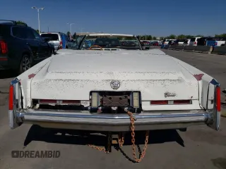 1976 Cadillac Eldorado z VIN 6L67S4Q405945, wystawiony jako Copart lot #73257834 z przebiegiem 98 761 mil mil oraz Nie do naprawy • Non repairable. Historia ofert i sprzedaży dostępna na DreamBid. Obrazek 6.