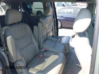2009 Honda Odyssey EX-L with VIN 5FNRL38779B013943, listed as a IAAI auction lot 42119422 with 147,285 mi miles. Bid and sale history available at carsss.com. Image 8.
