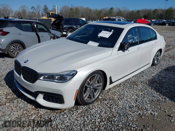 2017 BMW 7 Series 750i with VIN WBA7F0C34HGM21738, listed as a IAAI auction lot 41772933 with 62,923 mi miles and . Bid and sale history available at DreamBid. Image 2.