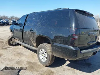 2011 Chevrolet Suburban LT with VIN 1GNSKJE30BR201074, listed as a IAAI auction lot 41986073 with 182,611 mi miles. Bid and sale history available at carsss.com. Image 3.