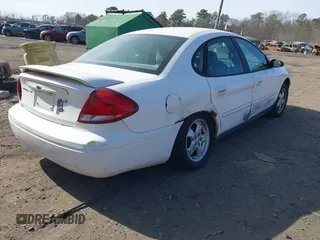 2006 Ford Taurus SE Standard with VIN 1FAHP53U96A196202, listed as a IAAI auction lot 41624553 with 203,188 mi miles and . Bid and sale history available at DreamBid. Image 6.