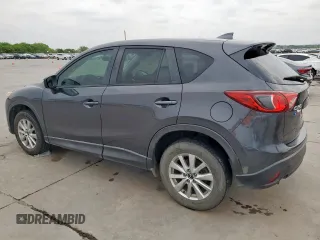 2016 Mazda CX-5 Touring z VIN JM3KE2CY7G0654292, wystawiony jako Copart lot #53433745 z przebiegiem 168 273 mil mil oraz Szkoda całkowita • Salvage title. Historia ofert i sprzedaży dostępna na DreamBid. Obrazek 2.