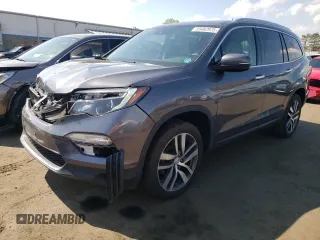 2017 Honda Pilot Touring with VIN 5FNYF6H9XHB023385, listed as a Copart auction lot 55482975 with 105,039 mi miles and Salvage Title. Bid and sale history available at carsss.com. Image 1.