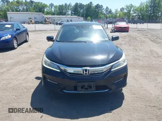 2016 Honda Accord Touring with VIN 1HGCR3F93GA036152, listed as a IAAI auction lot 42134354 with 233,311 mi miles and . Bid and sale history available at DreamBid. Image 12.