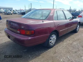 1996 Toyota Camry DX with VIN 4T1BG12K1TU785209, listed as a IAAI auction lot 41802026 with 223,452 mi miles. Bid and sale history available at carsss.com. Image 13.