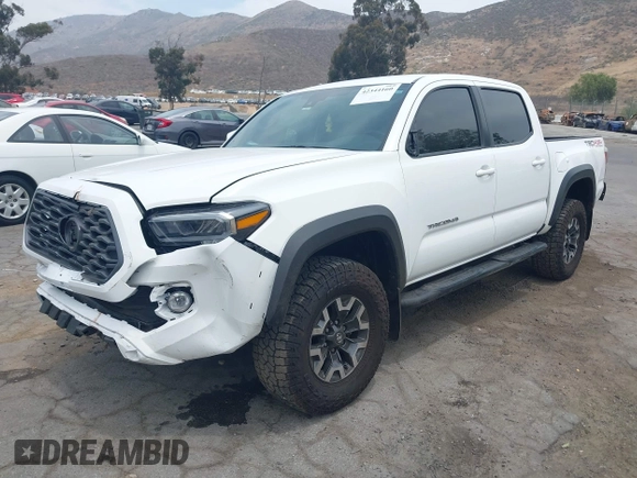 2023 Toyota Tacoma SR with VIN 3TMCZ5AN1PM556299, listed as a IAAI auction lot 42344160 with 42,338 mi miles and . Bid and sale history available at DreamBid. Image 21.
