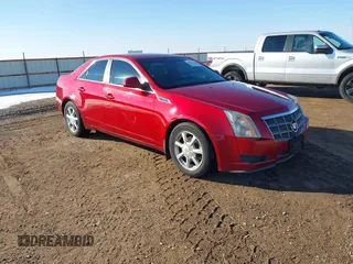 2009 Cadillac CTS AWD w/1SB with VIN 1G6DS57V390159184, listed as a IAAI auction lot 41323423 with 158,980 mi miles. Bid and sale history available at carsss.com. Image 1.