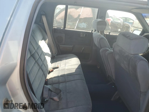 1989 Dodge Spirit z VIN 1B3BA46K1KF408949, wystawiony jako Copart lot #80767594 z przebiegiem 137 766 mil mil oraz Nie do naprawy. Historia ofert i sprzedaży dostępna na DreamBid. Obrazek 10.