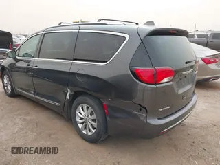 2018 Chrysler Pacifica Touring L with VIN 2C4RC1BG2JR116273, listed as a IAAI auction lot 41922292 with 125,159 mi miles and . Bid and sale history available at DreamBid. Image 3.