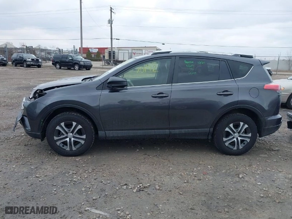 2016 Toyota RAV4 LE with VIN JTMBFREVXGJ091427, listed as a IAAI auction lot 42010142 with 165,548 mi miles. Bid and sale history available at carsss.com. Image 14.