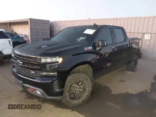 2021 Chevrolet Silverado 1500 LT Trail Boss with VIN 1GCPYFEL8MZ254411, listed as a IAAI auction lot 41313530 with 32,409 mi miles and . Bid and sale history available at DreamBid. Image 2.