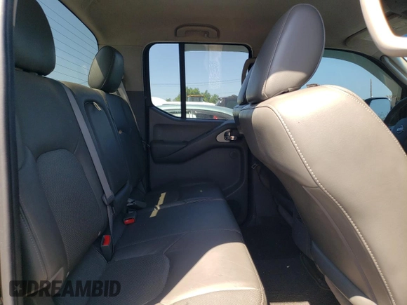 2010 Nissan Frontier Pro-4X with VIN 1N6AD0EV1AC447205, listed as a Copart auction lot 62007355 with 128,371 mi miles and Clean title. Bid and sale history available at DreamBid. Image 10.