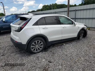 2019 Cadillac XT4 FWD Sport with VIN 1GYFZER44KF210582, listed as a Copart auction lot 61272015 with 104,073 mi miles and Salvage title. Bid and sale history available at DreamBid. Image 3.
