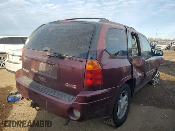 2004 GMC Envoy SLE with VIN 1GKDT13S342304711, listed as a Copart auction lot 44695385 with 129,804 mi miles and Salvage Title. Bid and sale history available at carsss.com. Image 3.