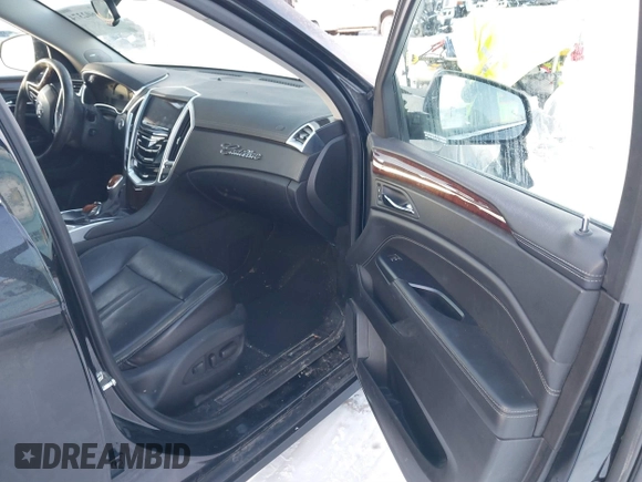2015 Cadillac SRX Premium Collection with VIN 3GYFNGE38FS593965, listed as a IAAI auction lot 41602374 with 97,949 mi miles. Bid and sale history available at carsss.com. Image 5.