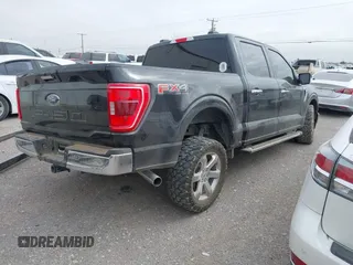 2021 Ford F-150 XL with VIN 1FTFW1E59MFA72823, listed as a IAAI auction lot 41366010 with 66,001 mi miles. Bid and sale history available at carsss.com. Image 4.