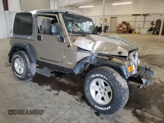 2004 Jeep Wrangler Rubicon z VIN 1J4FA69S44P784141, wystawiony jako Copart lot #55235305 z przebiegiem 125 564 mil mil oraz Szkoda całkowita • Salvage title. Historia ofert i sprzedaży dostępna na DreamBid. Obrazek 4.