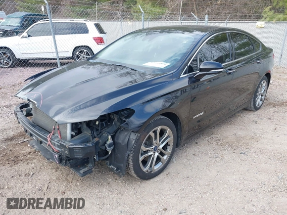 2019 Ford Fusion Hybrid Titanium with VIN 3FA6P0RU4KR144445, listed as a IAAI auction lot 42059840 with 90,617 mi miles. Bid and sale history available at carsss.com. Image 22.