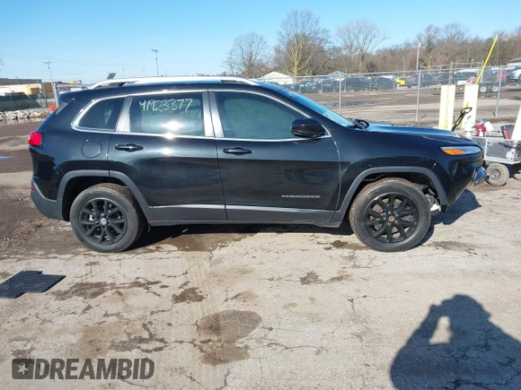 2016 Jeep Cherokee 75th Anniversary with VIN 1C4PJLCB5GW107918, listed as a IAAI auction lot 41923377 with 165,619 mi miles and . Bid and sale history available at DreamBid. Image 13.