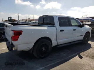 2018 Nissan Titan SV with VIN 1N6AA1E68JN533364, listed as a Copart auction lot 56190705 with 75,314 mi miles and Salvage Title. Bid and sale history available at DreamBid. Image 3.