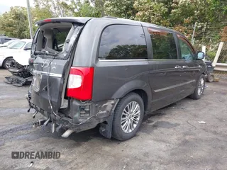 2014 Chrysler Town & Country Touring L with VIN 2C4RC1CG6ER195502, listed as a IAAI auction lot 42009629 with 126,157 mi miles and . Bid and sale history available at DreamBid. Image 4.