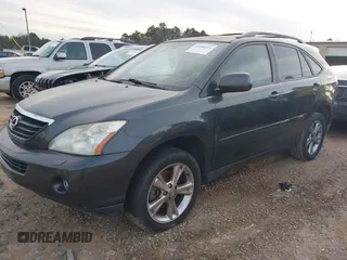 2007 Lexus RX 400h z VIN JTJGW31U372002594, wystawiony jako IAAI lot #41380924 z przebiegiem 243 928 mil mil oraz . Historia ofert i sprzedaży dostępna na DreamBid. Obrazek 2.