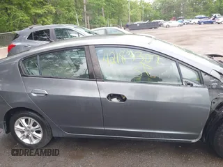 2010 Honda Insight EX with VIN JHMZE2H73AS025856, listed as a IAAI auction lot 42183307 with 71,564 mi miles and . Bid and sale history available at DreamBid. Image 14.