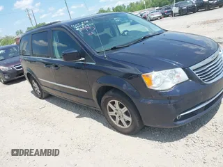 2011 Chrysler Town & Country Touring with VIN 2A4RR5DG7BR697932, listed as a IAAI auction lot 42231254 with 151,866 mi miles and . Bid and sale history available at DreamBid. Image 1.