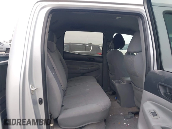 2009 Toyota Tacoma PreRunner with VIN 3TMJU62NX9M081748, listed as a IAAI auction lot 41608525 with 210,999 mi miles. Bid and sale history available at carsss.com. Image 8.