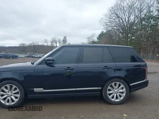 2015 Land Rover Range Rover HSE z VIN SALGS2VF8FA206003, wystawiony jako IAAI lot #41924522 z przebiegiem 115 265 mil mil oraz . Historia ofert i sprzedaży dostępna na DreamBid. Obrazek 14.