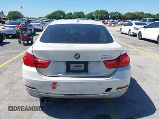 2015 BMW 4 Series 428i with VIN WBA4A5C58FGK15335, listed as a IAAI auction lot 41723243 with 152,652 mi miles and . Bid and sale history available at DreamBid. Image 15.