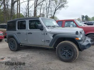 2021 Jeep Wrangler Unlimited Sport S with VIN 1C4HJXDN3MW717266, listed as a IAAI auction lot 41940869 with 113,386 mi miles. Bid and sale history available at carsss.com. Image 13.