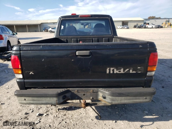 1999 Mazda B-Series 2WD Truck SX with VIN 4F4YR12C1XTM30111, listed as a Copart auction lot 81232584 with 167,752 mi miles and Clean Title. Bid and sale history available at carsss.com. Image 6.