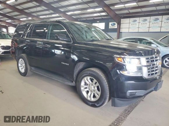 2015 Chevrolet Tahoe LS with VIN 1GNSCAKC9FR301715, listed as a Copart auction lot 64249005 with 107,240 mi miles and Clean title. Bid and sale history available at DreamBid. Image 4.