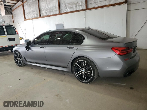2017 BMW 7 Series 750i with VIN WBA7F0C31HGM22359, listed as a Copart auction lot 56306875 with 90,642 mi miles and Salvage title. Bid and sale history available at DreamBid. Image 2.