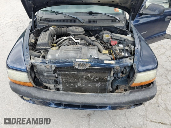 2002 Dodge Dakota z VIN 1B7GG32X32S546515, wystawiony jako Copart lot #57888695 z przebiegiem 81 202 mil mil oraz Szkoda całkowita • Salvage title. Historia ofert i sprzedaży dostępna na DreamBid. Obrazek 11.