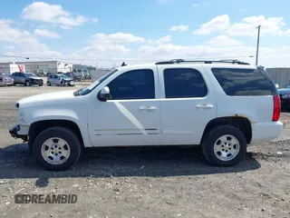2009 GMC Yukon SLT w/4SA with VIN 1GKFK33059R282974, listed as a IAAI auction lot 42013219 with 209,240 mi miles. Bid and sale history available at carsss.com. Image 14.