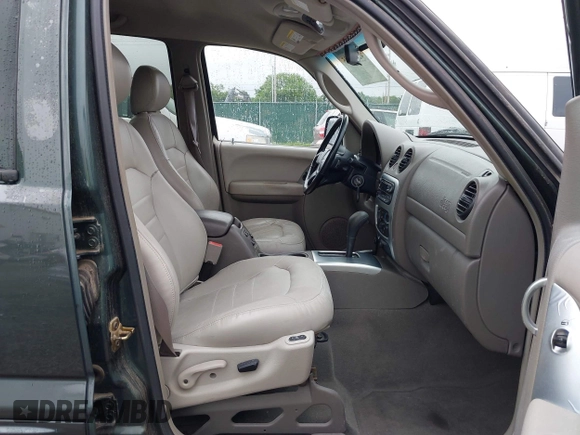 2002 Jeep Liberty Limited z VIN 1J4GL58K12W213087, wystawiony jako IAAI lot #42196895 z przebiegiem 85 110 mil mil oraz . Historia ofert i sprzedaży dostępna na DreamBid. Obrazek 5.