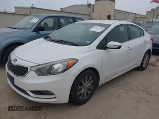 2014 Kia Forte EX with VIN KNAFX4A86E5090988, listed as a IAAI auction lot 41946793 with 130,568 mi miles. Bid and sale history available at carsss.com. Image 2.