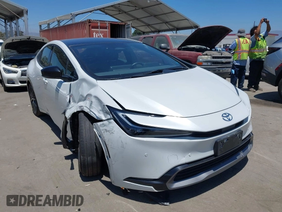 2024 Toyota Prius LE with VIN JTDACAAU2R3020703, listed as a IAAI auction lot 42644240 with 32,715 mi miles and . Bid and sale history available at DreamBid. Image 1.