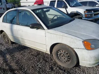 2003 Honda Civic LX with VIN 1HGES16523L014348, listed as a IAAI auction lot 42015881 with 271,832 mi miles. Bid and sale history available at carsss.com. Image 6.