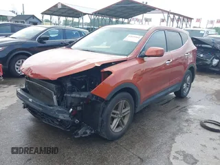 2017 Hyundai Santa Fe 2.4L z VIN 5XYZTDLB6HG451345, wystawiony jako IAAI lot #42665264 z przebiegiem 129 855 mil mil oraz . Historia ofert i sprzedaży dostępna na DreamBid. Obrazek 2.