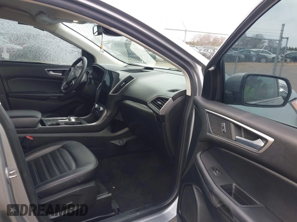 2022 Ford Edge SEL z VIN 2FMPK4J93NBA94793, wystawiony jako IAAI lot #41884687 z przebiegiem 57 372 mil mil oraz . Historia ofert i sprzedaży dostępna na DreamBid. Obrazek 5.