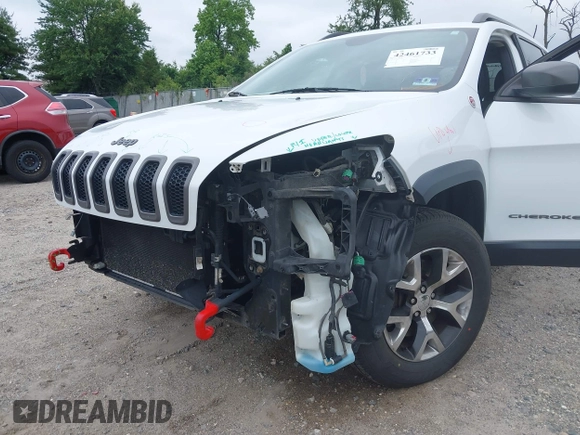 2014 Jeep Cherokee Trailhawk z VIN 1C4PJMBS4EW210719, wystawiony jako IAAI lot #42461733 z przebiegiem 134 096 mil mil oraz . Historia ofert i sprzedaży dostępna na DreamBid. Obrazek 6.